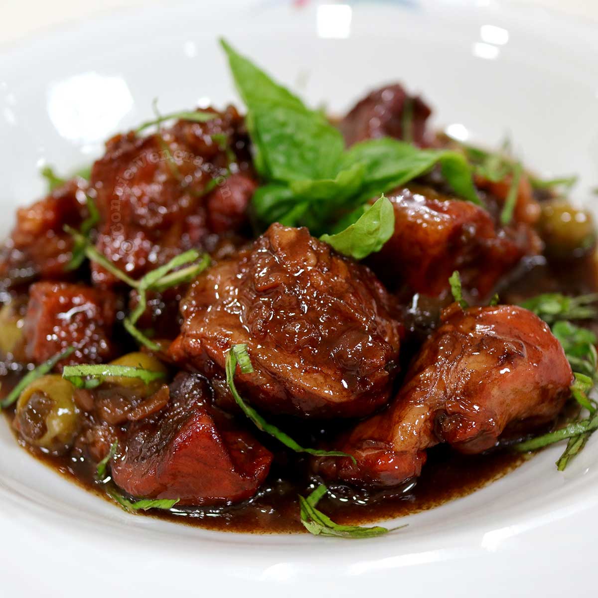 Italian-style sweet sour pork stew (spezzatino agrodolce)