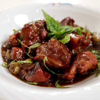Italian-style sweet sour pork stew (spezzatino agrodolce)
